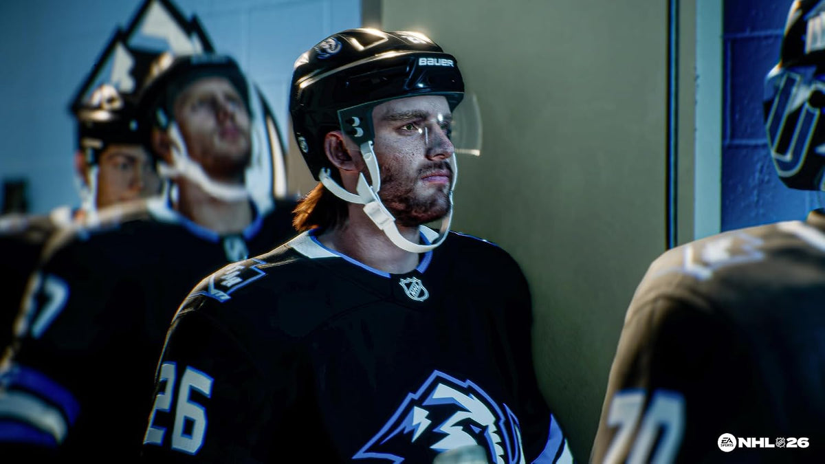 Hockey player in a locker room with teammates