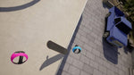 Three colorful rings on a concrete surface with a blue cart in the background. From the game VR Skater for PlayStation 5.