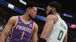 Two basketball players from Phoenix and Boston facing each other on a court. From the game NBA 2K23 for PlayStation 5.