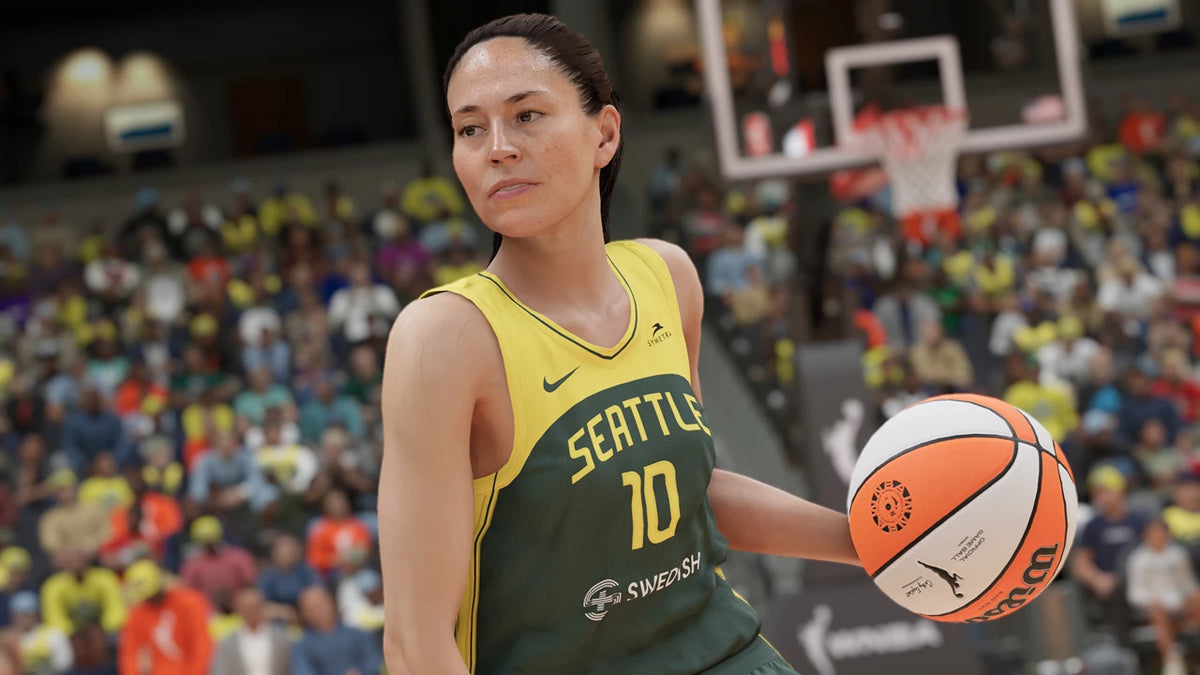 Basketball player holding a ball in a stadium with fans in the background. From the game NBA 2K23 for PlayStation 5.