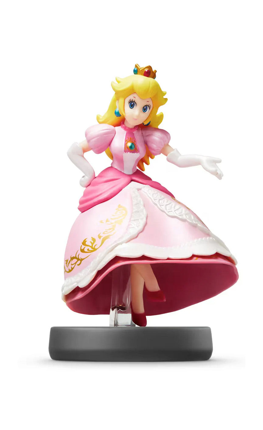 Amiibo figure of Princess Peach in a pink dress with a crown on a white background