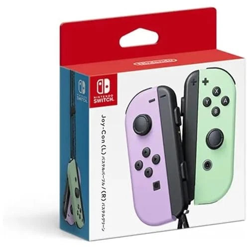 Nintendo Switch Joy-Con (L)/(R) split controller in pastel purple and mint green, shown in its original retail packaging with a red and white box.