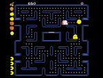 Atari 2600+ Pac-Man Double Feature gameplay screenshot showing a classic blue maze with Pac-Man, colourful ghosts, pellets and retro arcade graphics.