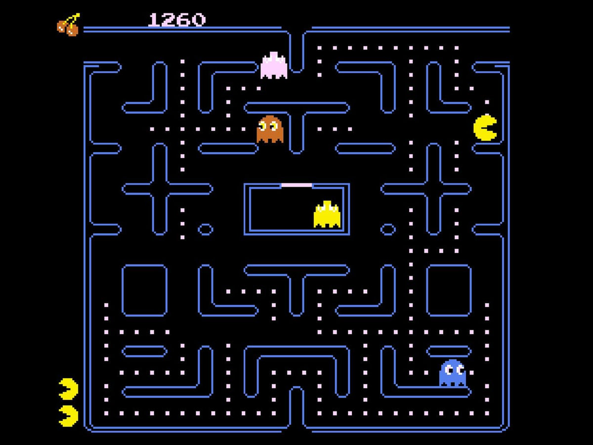 Pac-Man Double Feature gameplay on Atari 2600+ showing an alternative blue maze layout with Pac-Man, ghosts and classic arcade-style pixel graphics.
