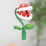 HORI Nintendo Switch 2 Piranha Plant Camera shown without its Warp Pipe base, highlighting the detachable Super Mario-inspired camera design with green leaves.