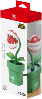 HORI Piranha Plant Camera for Nintendo Switch 2 in its official retail packaging, featuring the Super Mario-inspired camera and green Warp Pipe stand.