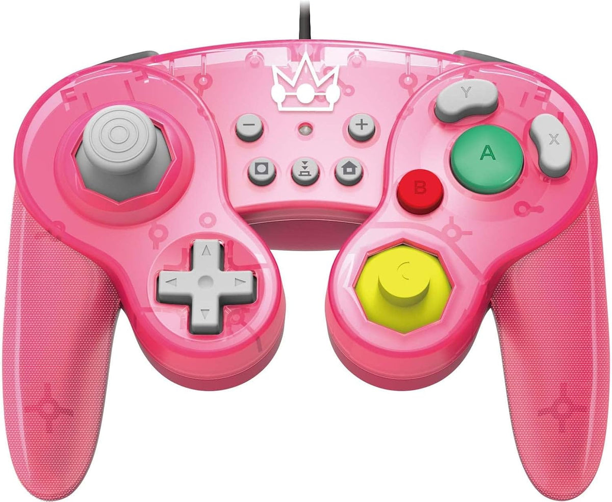HORI Princess Peach Battle Pad wired controller for Nintendo Switch, front view showing its pink GameCube-style design, Princess Peach artwork, grey D-pad and colourful buttons.