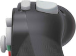 Close-up side view of the HORI Zelda Battle Pad Nintendo Switch controller showing the shoulder buttons, textured black hand grip and GameCube-style ergonomic design.