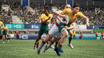 Jonah Lomu Rugby Challenge 4 Nintendo Switch gameplay featuring a rugby player carrying the ball while being tackled by opponents in yellow and green kits.