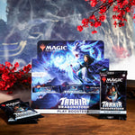 Magic The Gathering Tarkir Dragonstorm Play Booster Box promotional image showing the 2025 MTG expansion artwork alongside individual trading card booster packs.