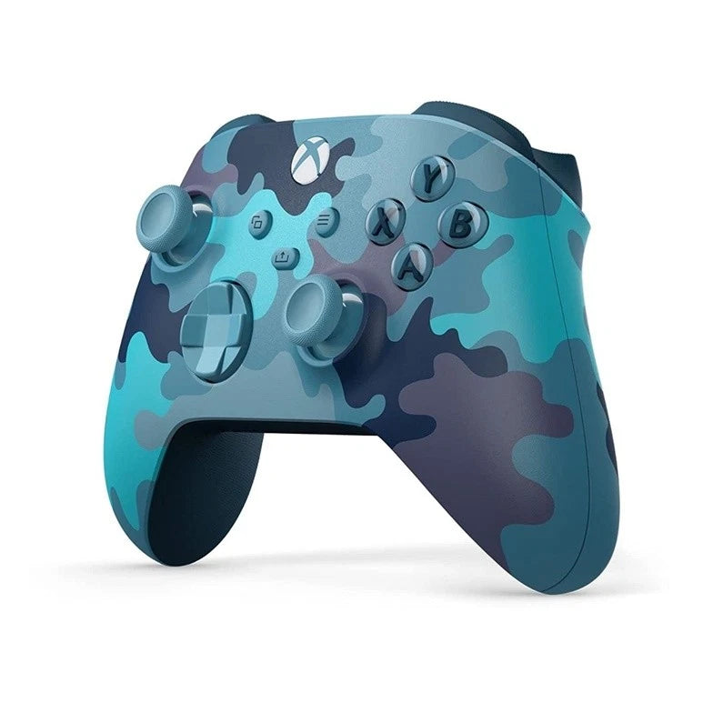 Xbox Wireless Controller in Mineral Camo Special Edition shown from a right angle, featuring the distinctive aqua, dark purple and mineral blue camouflage pattern.