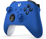 Microsoft Xbox Wireless Controller in Shock Blue shown at an angle, highlighting its bright blue finish, textured grips, black buttons and ergonomic design.