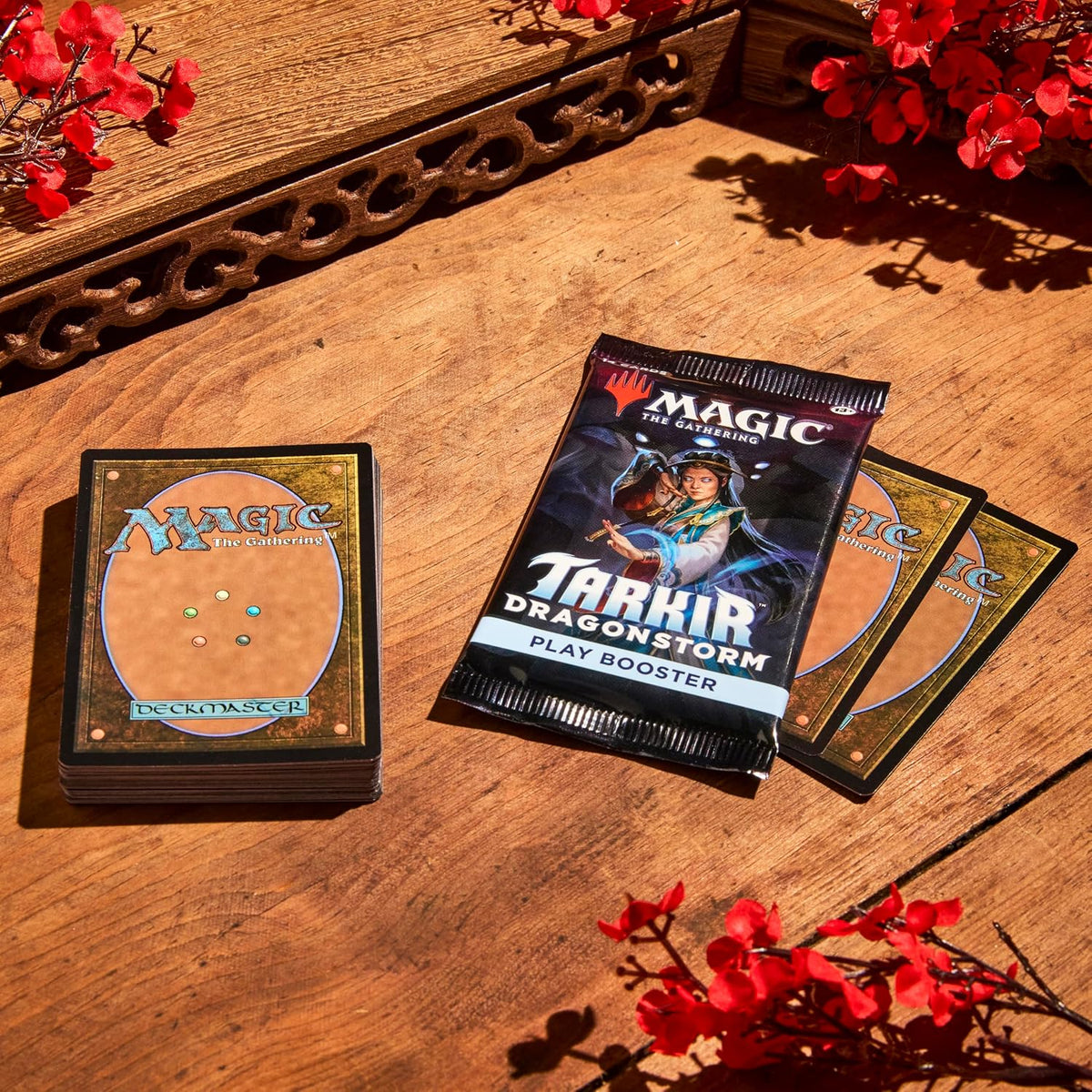 Tarkir Dragonstorm Magic The Gathering Play Booster Pack shown alongside MTG trading cards with the official Magic card back design.