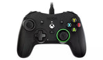 Nacon Revolution X Pro Wired Controller for Xbox Series X|S, Xbox One and PC, front view showing black casing, offset analogue sticks, green detailing and Xbox buttons.