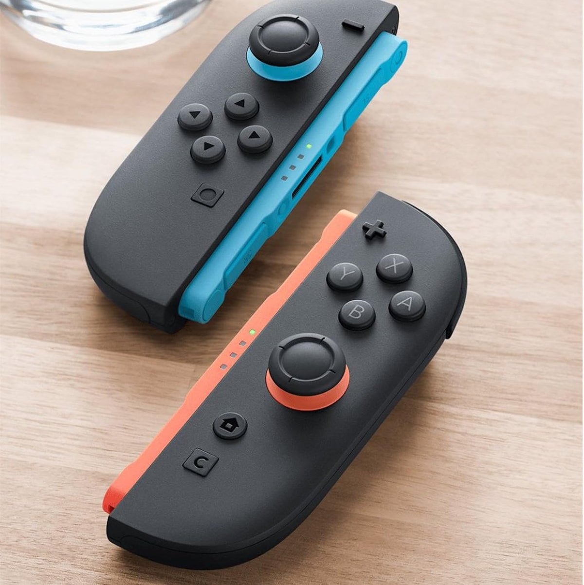 Nintendo Switch 2 Joy-Con 2 controller being used in mouse mode on a tabletop, demonstrating the built-in mouse sensor and new control functionality.