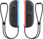 Nintendo Switch 2 Light Blue and Light Red Joy-Con 2 controllers displayed with their wrist strap accessories, showing the button layout and controller design.
