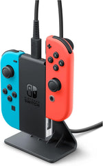 Nintendo Switch Joy-Con Charging Stand Two-Way with Neon Blue and Neon Red Joy-Con controllers attached, demonstrating the upright charging position.