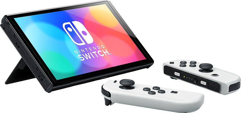 Nintendo Switch OLED White console displayed in tabletop mode using its adjustable kickstand, with detached white Joy-Con controllers alongside.