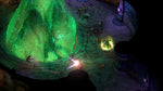 Pillars of Eternity II Deadfire Xbox One gameplay featuring characters exploring a mysterious underground cavern illuminated by glowing green magical crystals.