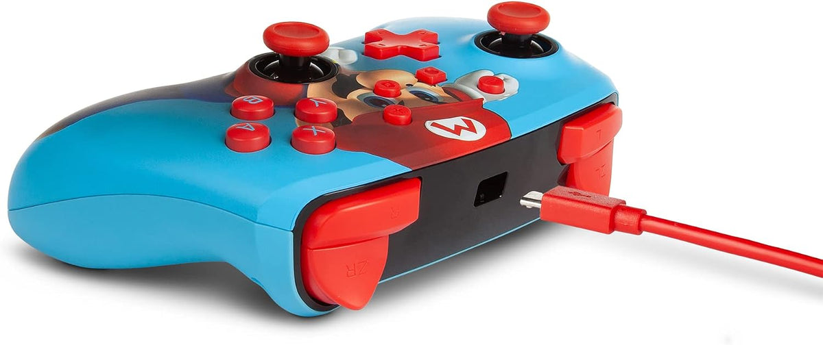 Side profile of the PowerA Mario Punch Nintendo Switch Wired Controller, showing its curved blue ergonomic grip, raised analogue sticks, red triggers and USB cable connection.