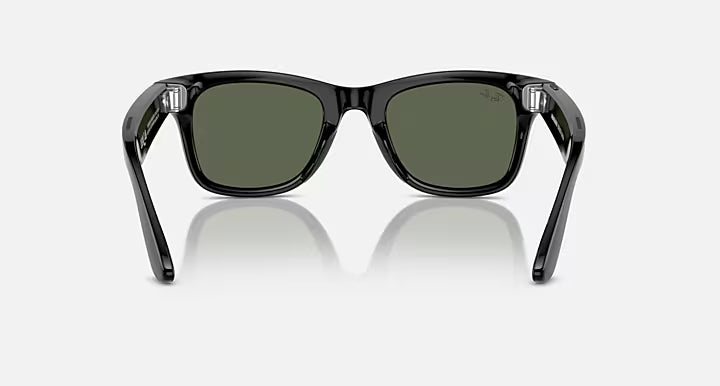 Ray-Ban Meta Wayfarer AI Smart Glasses in Shiny Black with G-15 Green lenses, shown with the temples open to display the full frame design.