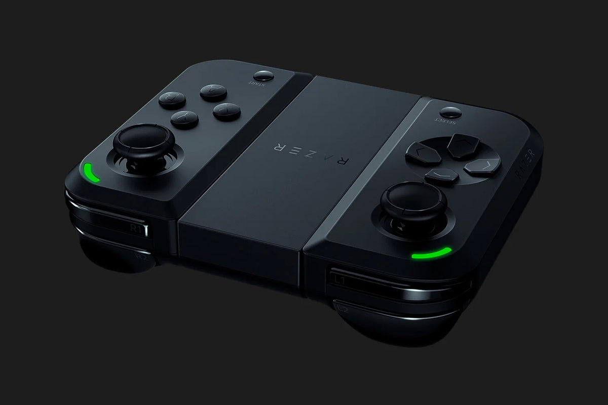 Razer Junglecat wireless gaming controller shown at an angle, highlighting its compact black body, modular design, dual analogue sticks and green accents.