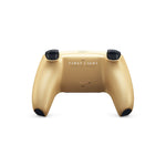 Rear view of the Sony PlayStation 5 DualSense 007 First Light Limited Edition wireless controller, showing the metallic gold back casing, black shoulder buttons and ergonomic grips.