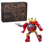 Transformers Legacy Generations Selects Lift-Ticket figure displayed beside the collector packaging