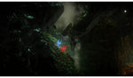 Unravel Two Nintendo Switch gameplay featuring the two Yarny characters navigating a dark cave environment