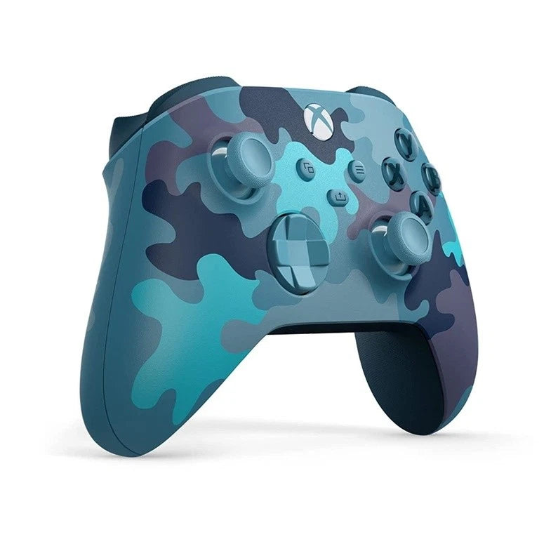 Microsoft Xbox Mineral Camo Special Edition wireless controller shown from a left angle, highlighting its blue camouflage finish, sculpted grips and Xbox gaming controls.