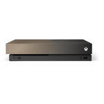 Front view of Microsoft Xbox One X 1TB Gold Rush Edition console with metallic gradient finish